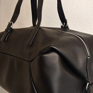 Black leather duffle from Theory